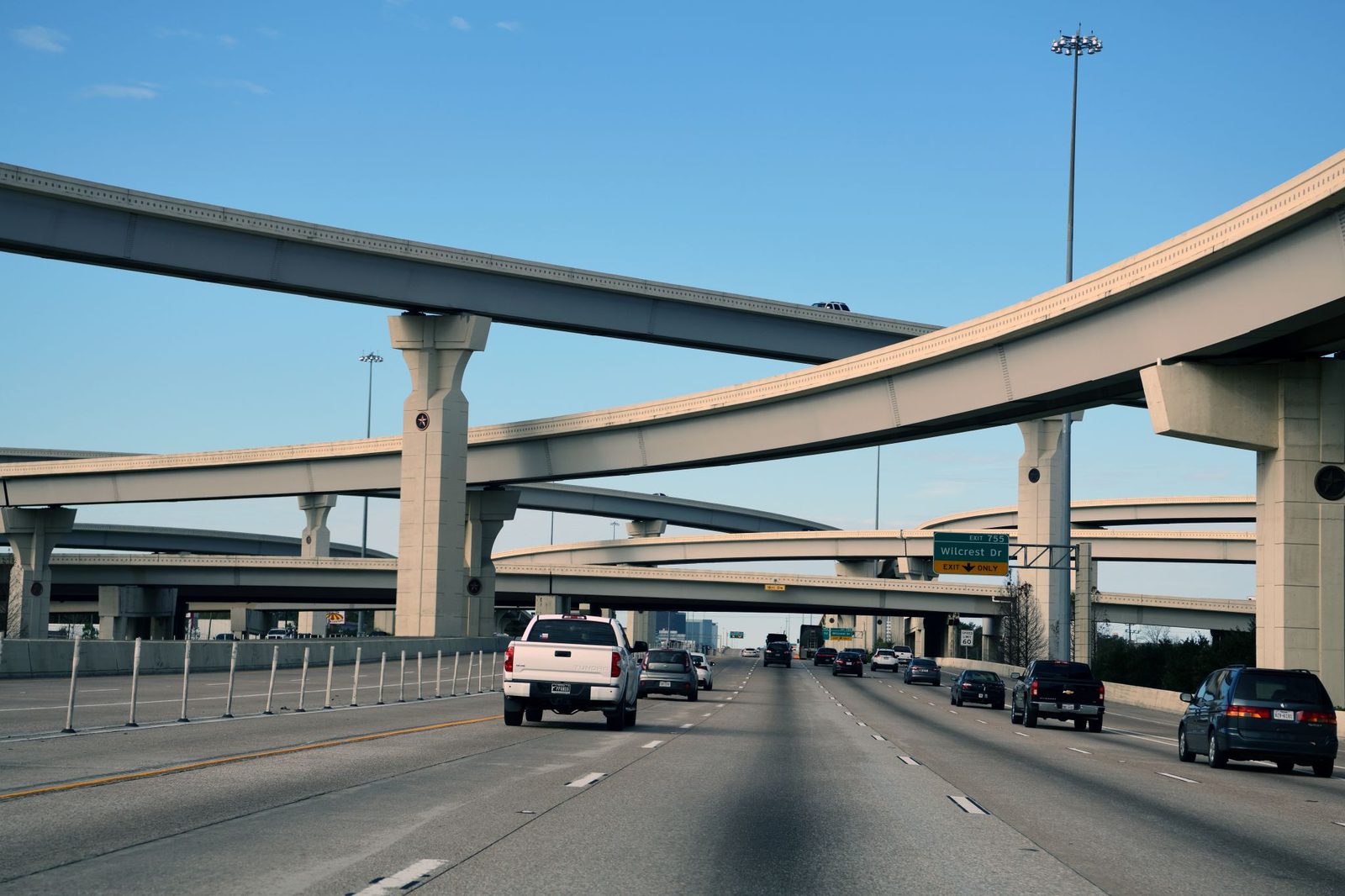 Ground-level view of the Beltway 8 elevated interchange ramps