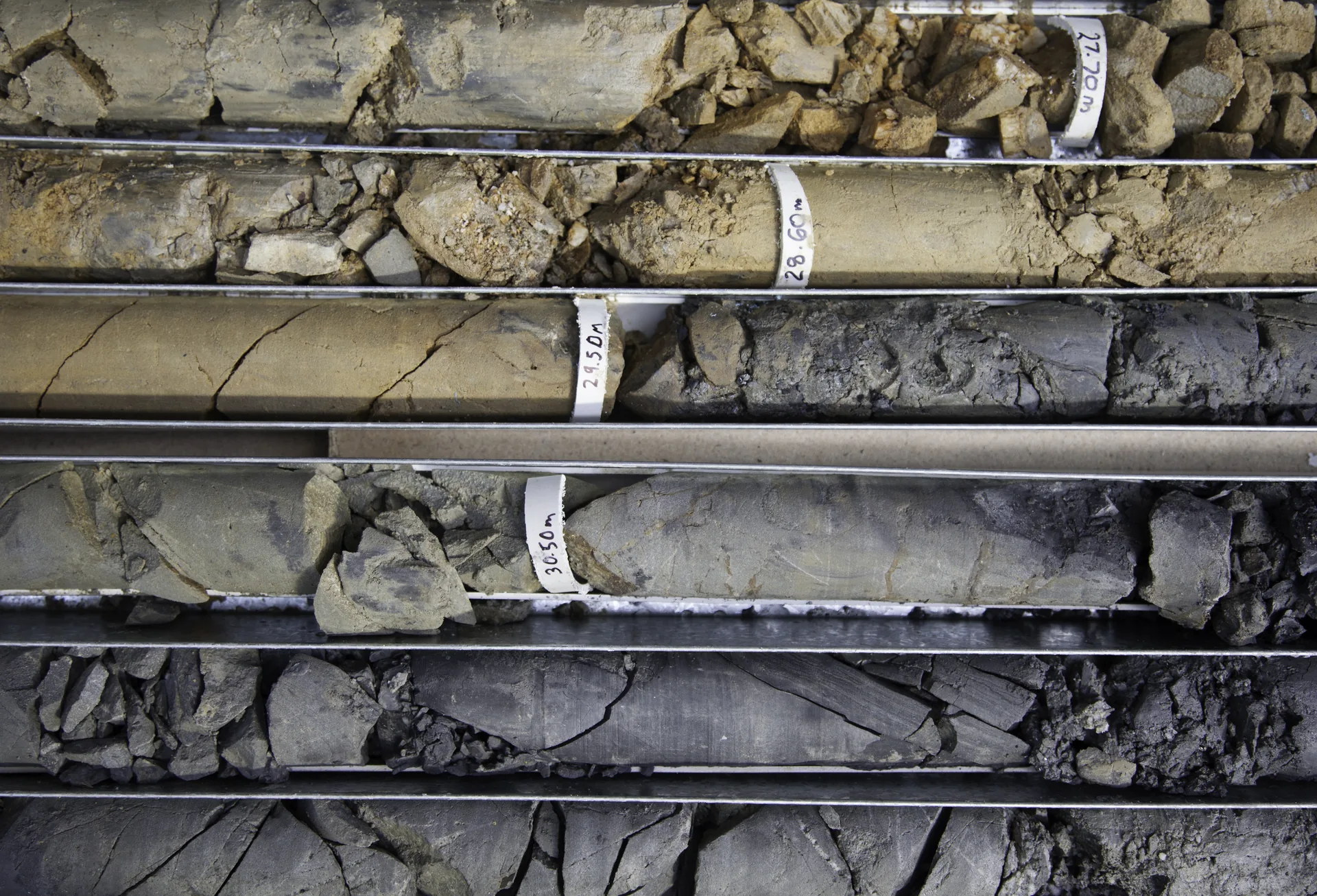 Drilled rock and soil core samples in sample boxes
